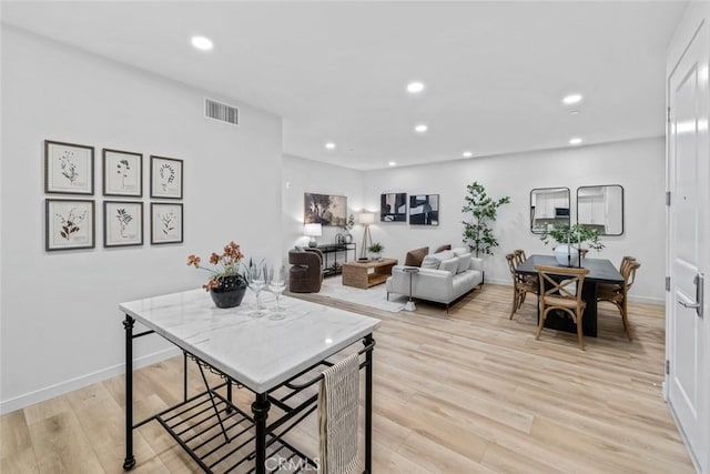 2475 Victoria Ave Unit 410, San Luis Obispo, CA 93401 - dining area featuring light wood-style floors, visible vents, baseboards, and recessed lighting
