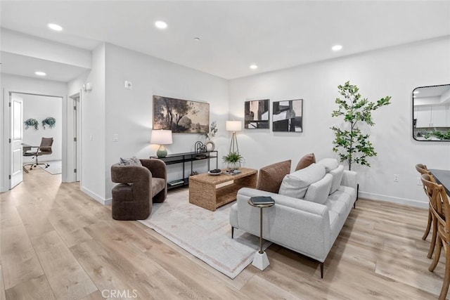 2475 Victoria Ave Unit 410, San Luis Obispo, CA 93401 - living area with light wood-type flooring, baseboards, and recessed lighting