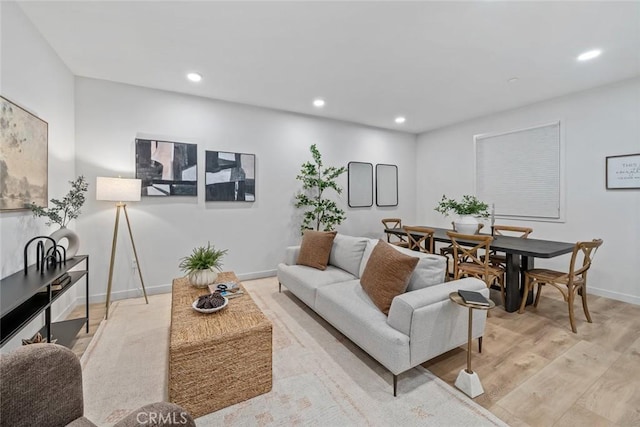 2475 Victoria Ave Unit 410, San Luis Obispo, CA 93401 - living room featuring baseboards, light wood-style floors, and recessed lighting