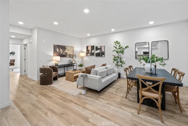 2475 Victoria Ave Unit 410, San Luis Obispo, CA 93401 - living area featuring light wood-style flooring, baseboards, and recessed lighting