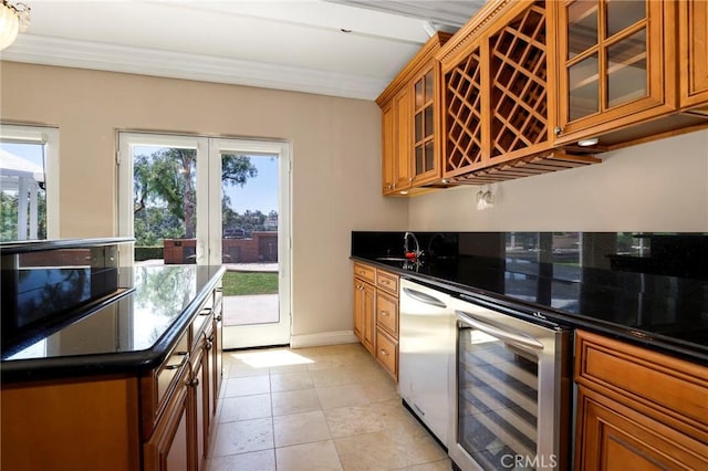 20454 Sartell Dr, Walnut, CA 91789 - kitchen with beverage cooler, dark countertops, brown cabinetry, and a wealth of natural light