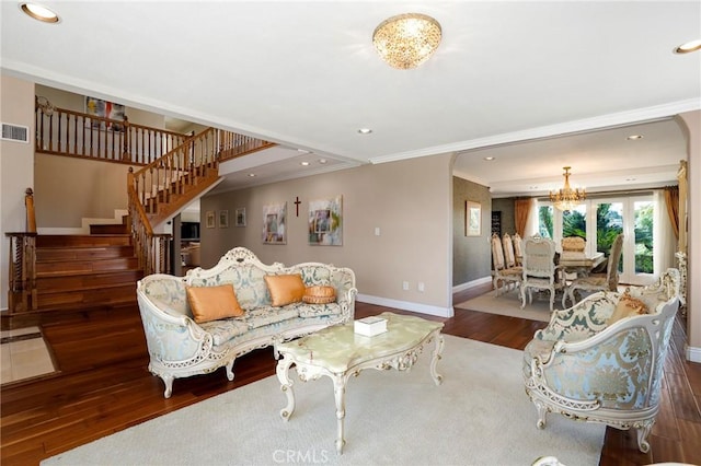 20454 Sartell Dr, Walnut, CA 91789 - living area featuring an inviting chandelier, ornamental molding, visible vents, wood finished floors, and baseboards