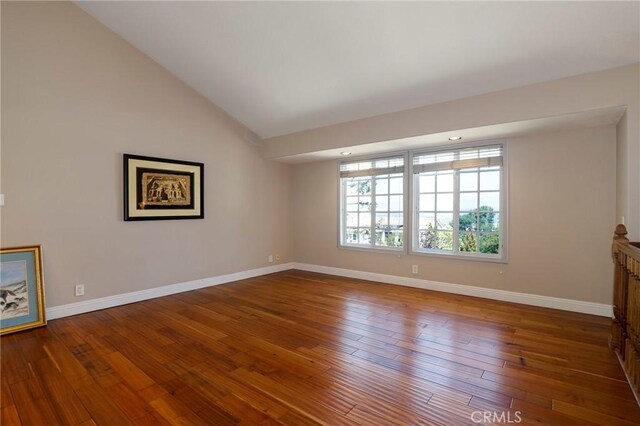 20454 Sartell Dr, Walnut, CA 91789 - interior space with baseboards, vaulted ceiling, and hardwood / wood-style floors