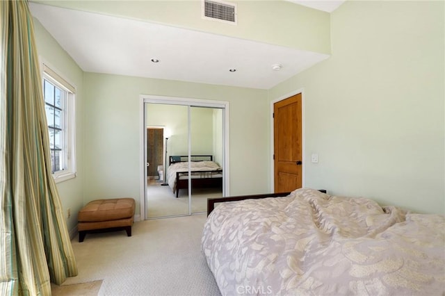 20454 Sartell Dr, Walnut, CA 91789 - bedroom featuring light colored carpet, baseboards, visible vents, and a closet