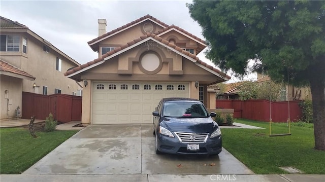 view of front of home featuring driveway, a chimney, a tile roof, fence, and a front lawn