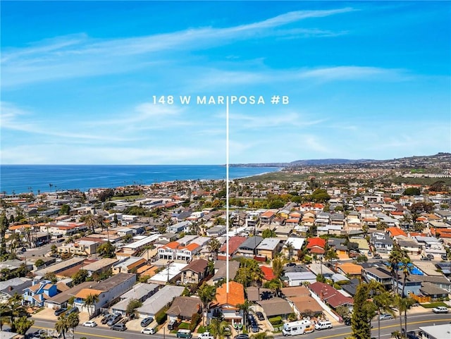 aerial view featuring a water view and a residential view