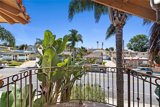 balcony featuring a residential view