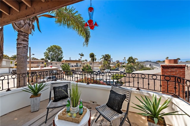 balcony featuring a residential view