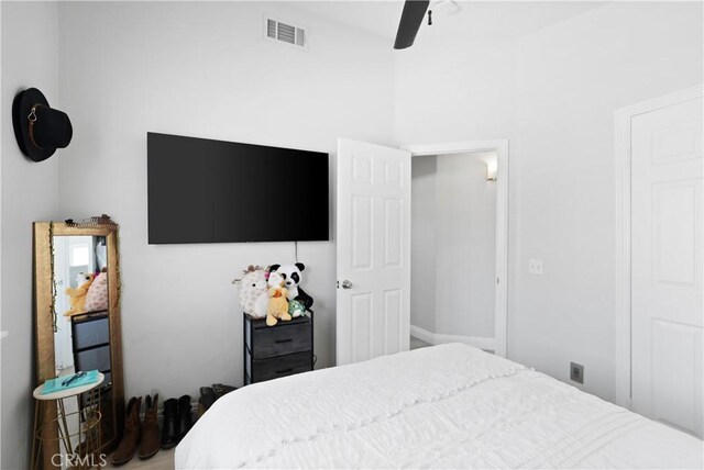 bedroom featuring visible vents and ceiling fan