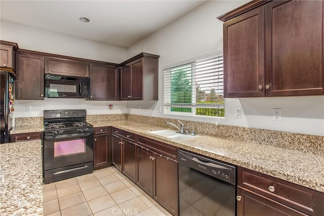 1229 Pinehurst Dr, Calimesa, CA 92320 - kitchen with black appliances, a sink, light tile patterned floors, light stone counters, and dark brown cabinets
