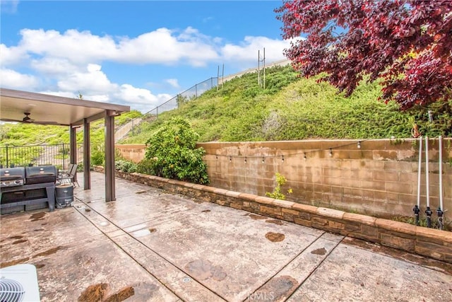 1229 Pinehurst Dr, Calimesa, CA 92320 - view of patio featuring a fenced backyard and ceiling fan