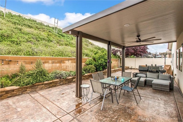 1229 Pinehurst Dr, Calimesa, CA 92320 - view of patio / terrace featuring outdoor lounge area, a fenced backyard, outdoor dining area, and a ceiling fan