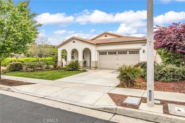 1229 Pinehurst Dr, Calimesa, CA 92320 - mediterranean / spanish-style home with stucco siding, a garage, concrete driveway, and a tile roof