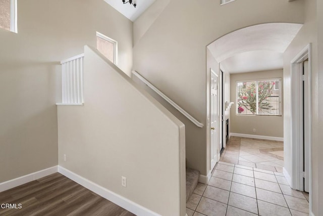 834 Corte Baya Vis, Oxnard, CA 93030 - staircase featuring arched walkways, baseboards, and tile patterned floors