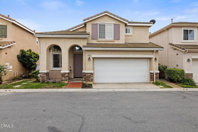 834 Corte Baya Vis, Oxnard, CA 93030 - traditional-style home with an attached garage, stucco siding, and a tiled roof