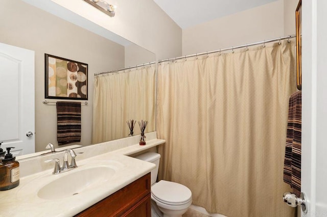 full bath with vanity and toilet