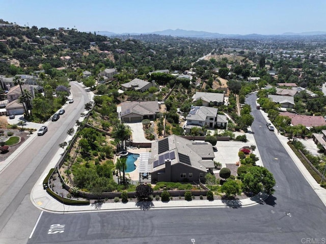 birds eye view of property with a residential view and a mountain view
