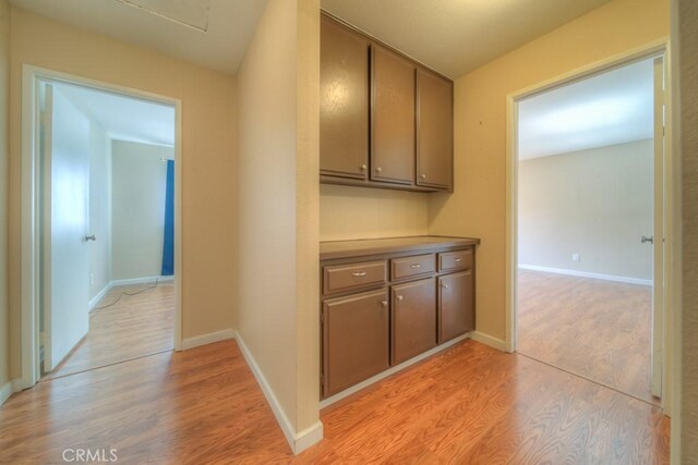24731 Huntley Dr, Moreno Valley, CA 92557 - hall featuring baseboards and light wood finished floors