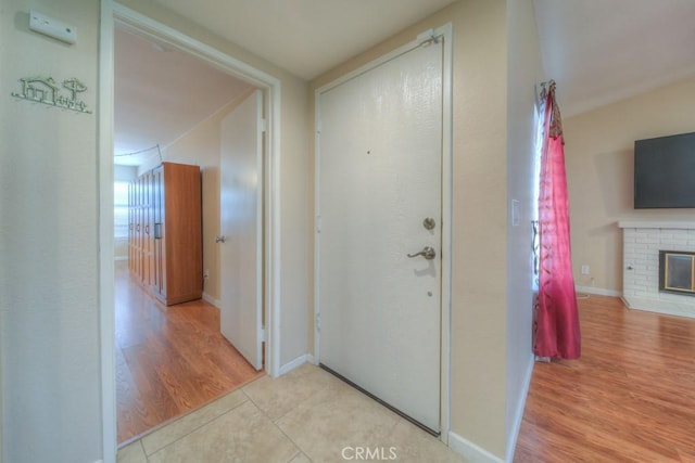 24731 Huntley Dr, Moreno Valley, CA 92557 - hallway with baseboards and wood finished floors