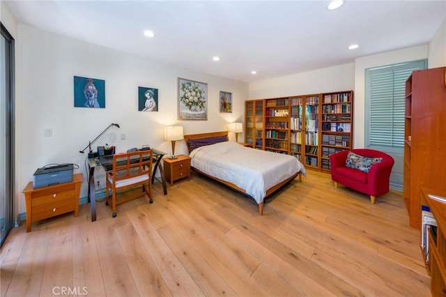 bedroom featuring light wood-style floors and recessed lighting