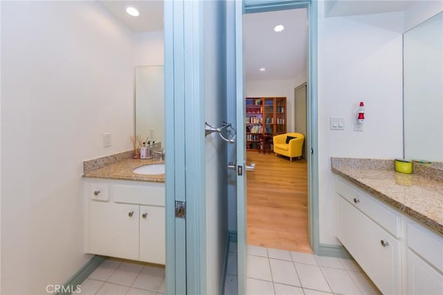 bathroom featuring vanity, recessed lighting, and tile patterned floors