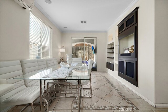 interior space with visible vents, crown molding, built in features, a wall mounted air conditioner, and baseboards