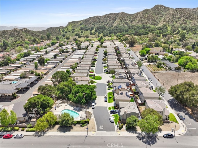 bird's eye view with a residential view and a mountain view