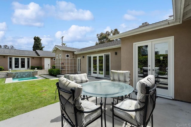view of patio featuring french doors, outdoor dining space, and an outdoor pool