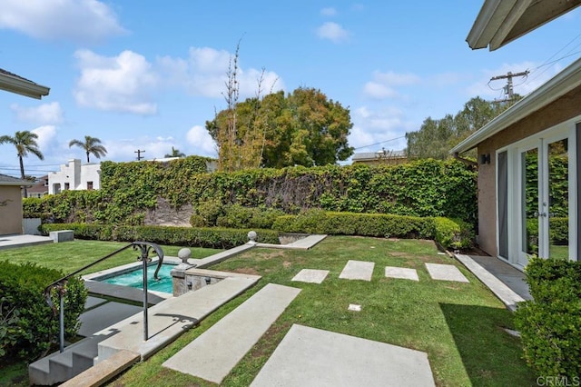 view of yard with a fenced backyard