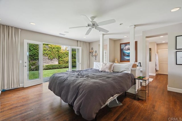 bedroom featuring recessed lighting, wood finished floors, and access to exterior