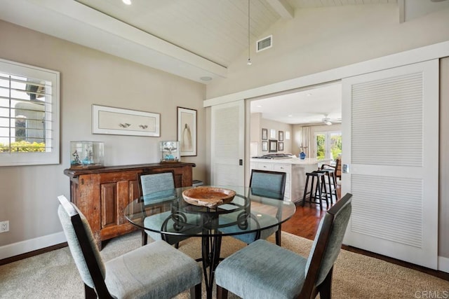 dining space with visible vents, wood finished floors, baseboards, recessed lighting, and vaulted ceiling with beams