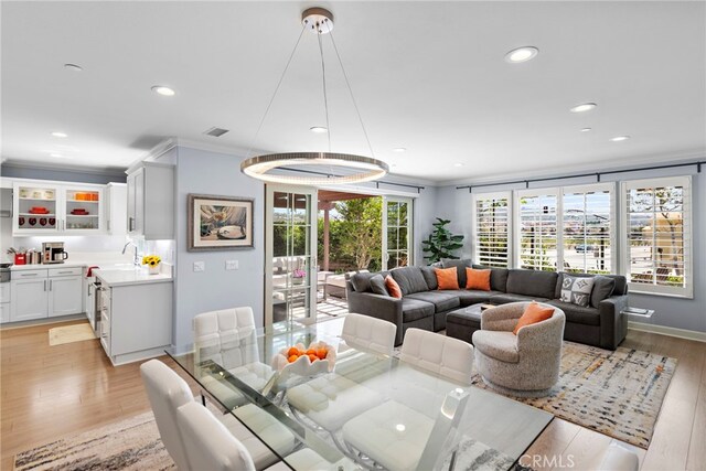 207 Via Galicia, San Clemente, CA 92672 - dining space with recessed lighting, light wood-style flooring, ornamental molding, and baseboards
