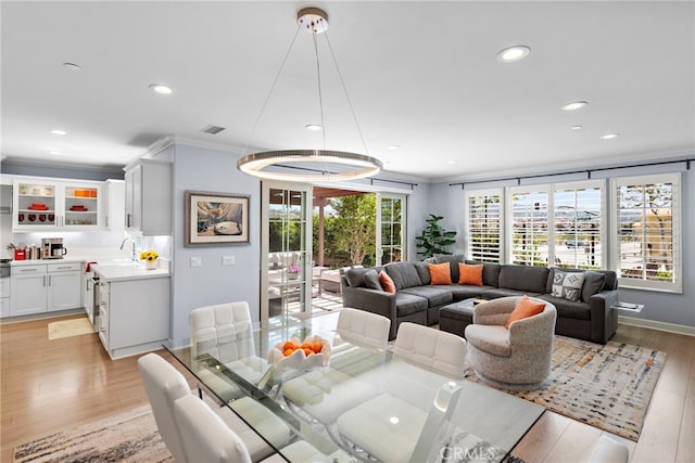 207 Via Galicia, San Clemente, CA 92672 - dining space featuring recessed lighting, light wood-style flooring, and ornamental molding