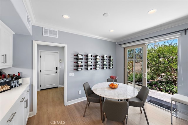 207 Via Galicia, San Clemente, CA 92672 - dining area with crown molding, light wood-style floors, recessed lighting, and baseboards