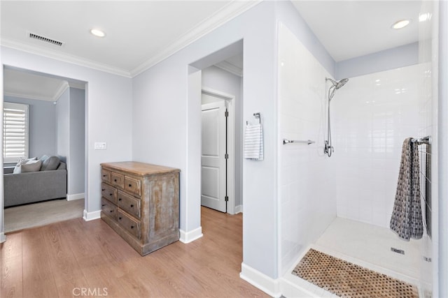 207 Via Galicia, San Clemente, CA 92672 - full bathroom featuring wood finished floors, tiled shower, baseboards, recessed lighting, and crown molding