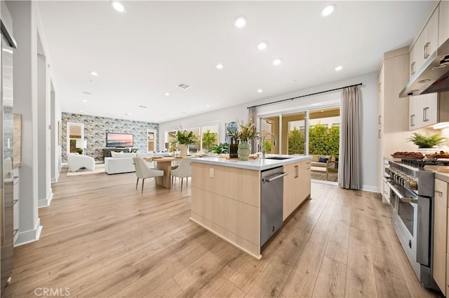 271 Huckleberry, Lake Forest, CA 92630 - kitchen featuring a sink, stainless steel appliances, under cabinet range hood, plenty of natural light, and light brown cabinets