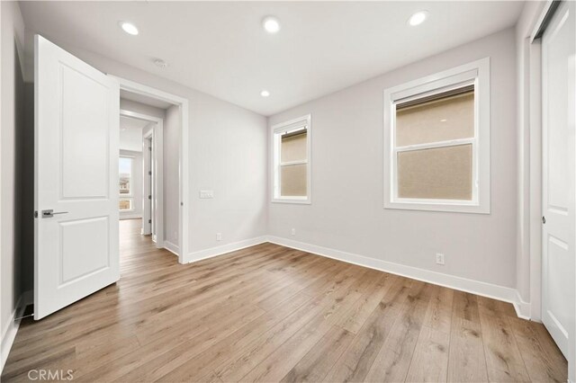 271 Huckleberry, Lake Forest, CA 92630 - unfurnished bedroom with light wood-style floors, baseboards, and recessed lighting