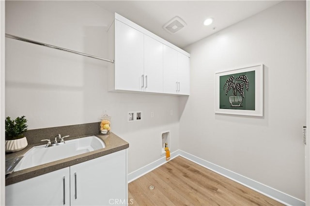 271 Huckleberry, Lake Forest, CA 92630 - laundry area featuring a sink, cabinet space, washer hookup, baseboards, and light wood-style floors