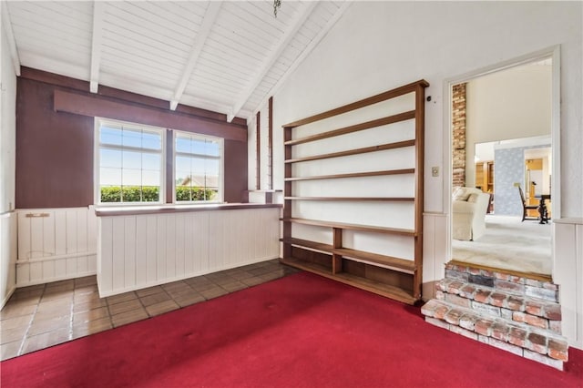 24940 Outlook Dr, Carmel, CA 93923 - carpeted spare room with wainscoting, wood ceiling, and tile patterned floors
