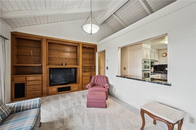 living area with lofted ceiling with beams, carpet flooring, and wooden ceiling