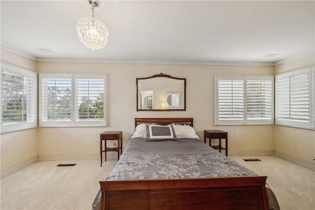 24940 Outlook Dr, Carmel, CA 93923 - bedroom featuring multiple windows, carpet floors, a chandelier, and ornamental molding