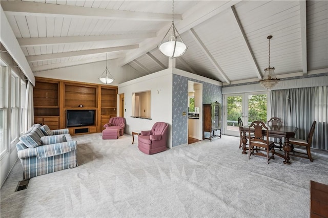 sunroom featuring visible vents and beam ceiling