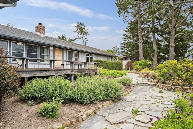 exterior space featuring a wooden deck