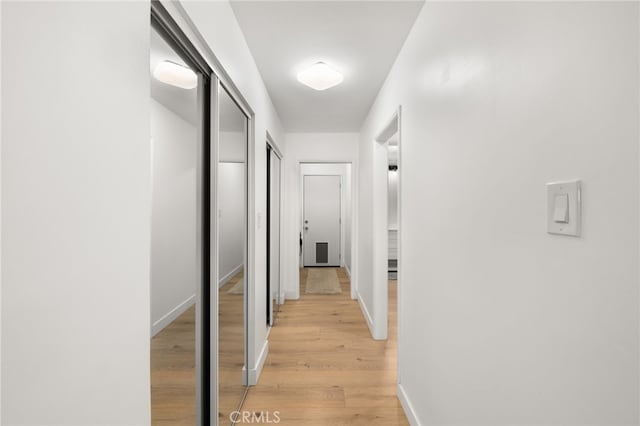 1326 Clock Ave, Redlands, CA 92374 - hall featuring baseboards and light wood-style flooring