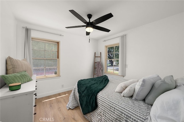 1326 Clock Ave, Redlands, CA 92374 - bedroom featuring baseboards, ceiling fan, and light wood-style flooring