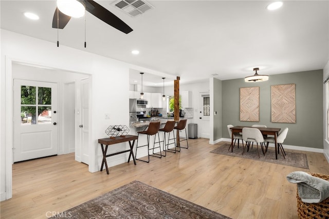 1326 Clock Ave, Redlands, CA 92374 - interior space with baseboards, recessed lighting, light wood-style flooring, and visible vents
