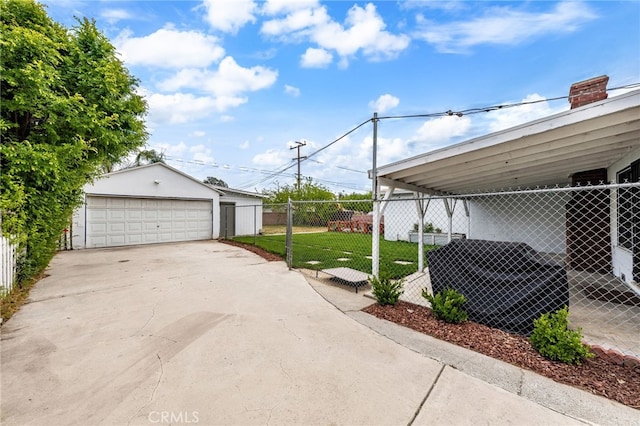 1326 Clock Ave, Redlands, CA 92374 - exterior space with a garage, fence, and an outbuilding