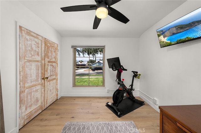 1326 Clock Ave, Redlands, CA 92374 - exercise room with baseboards, a ceiling fan, and light wood-style flooring