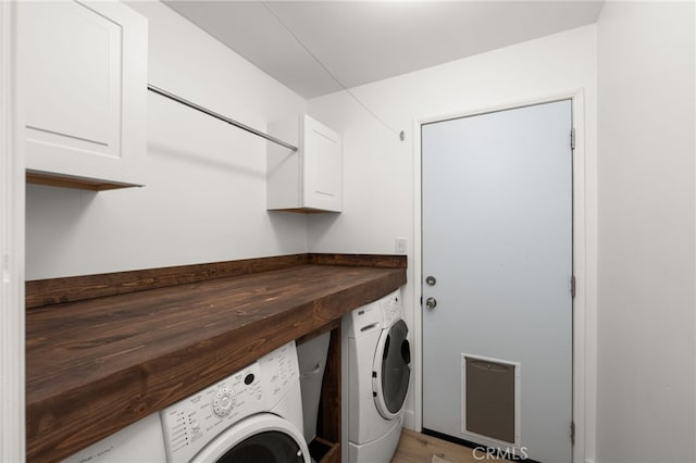 1326 Clock Ave, Redlands, CA 92374 - laundry area featuring separate washer and dryer and cabinet space