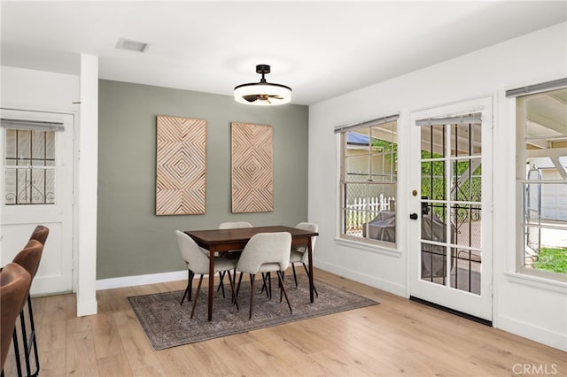 1326 Clock Ave, Redlands, CA 92374 - dining room with light wood-style floors, baseboards, french doors, and visible vents